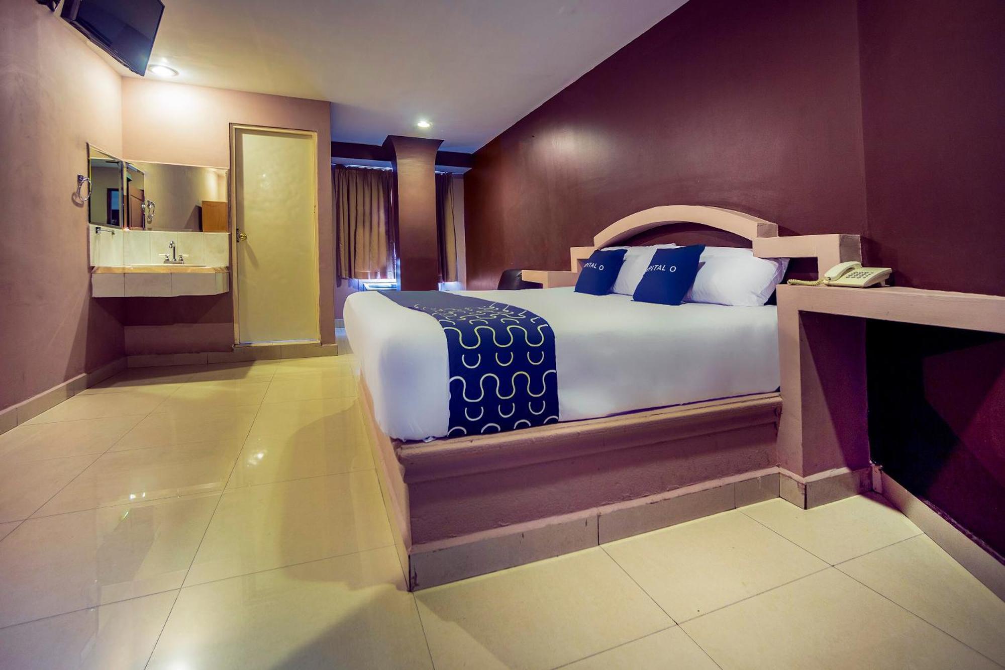 Capital O Diro, Hotel